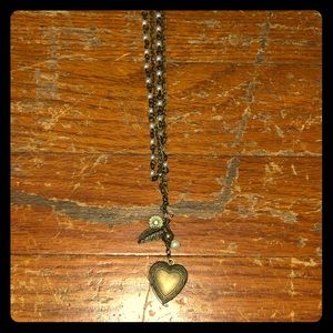 Brass locket with pearls